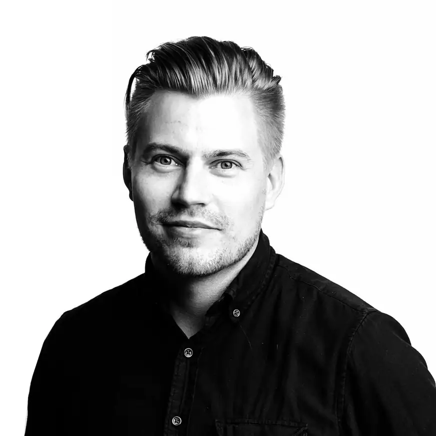 Black-and-white portrait of the site author